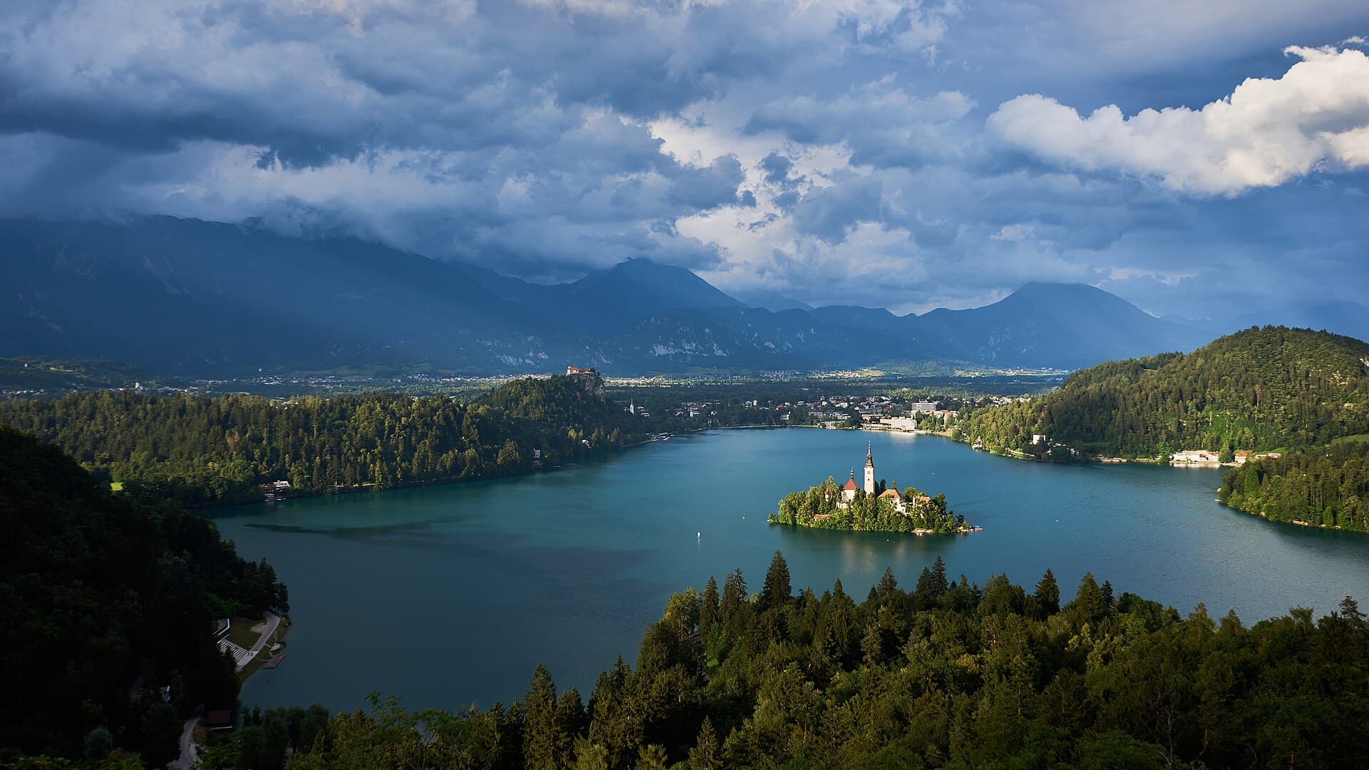 Bled Island and the lake beneath a mountain sky