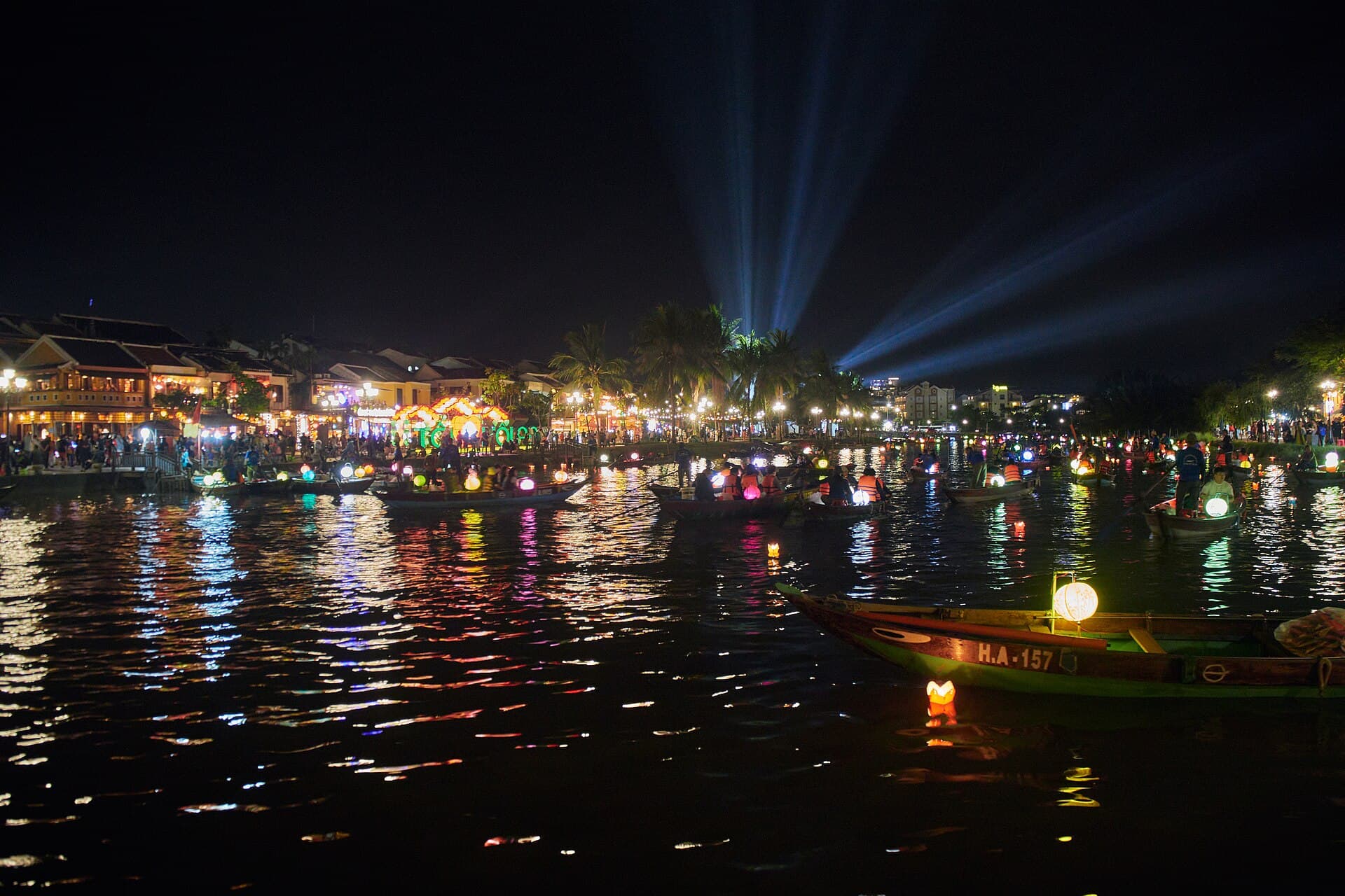 Lantern boats on the river in Hoi An after dark