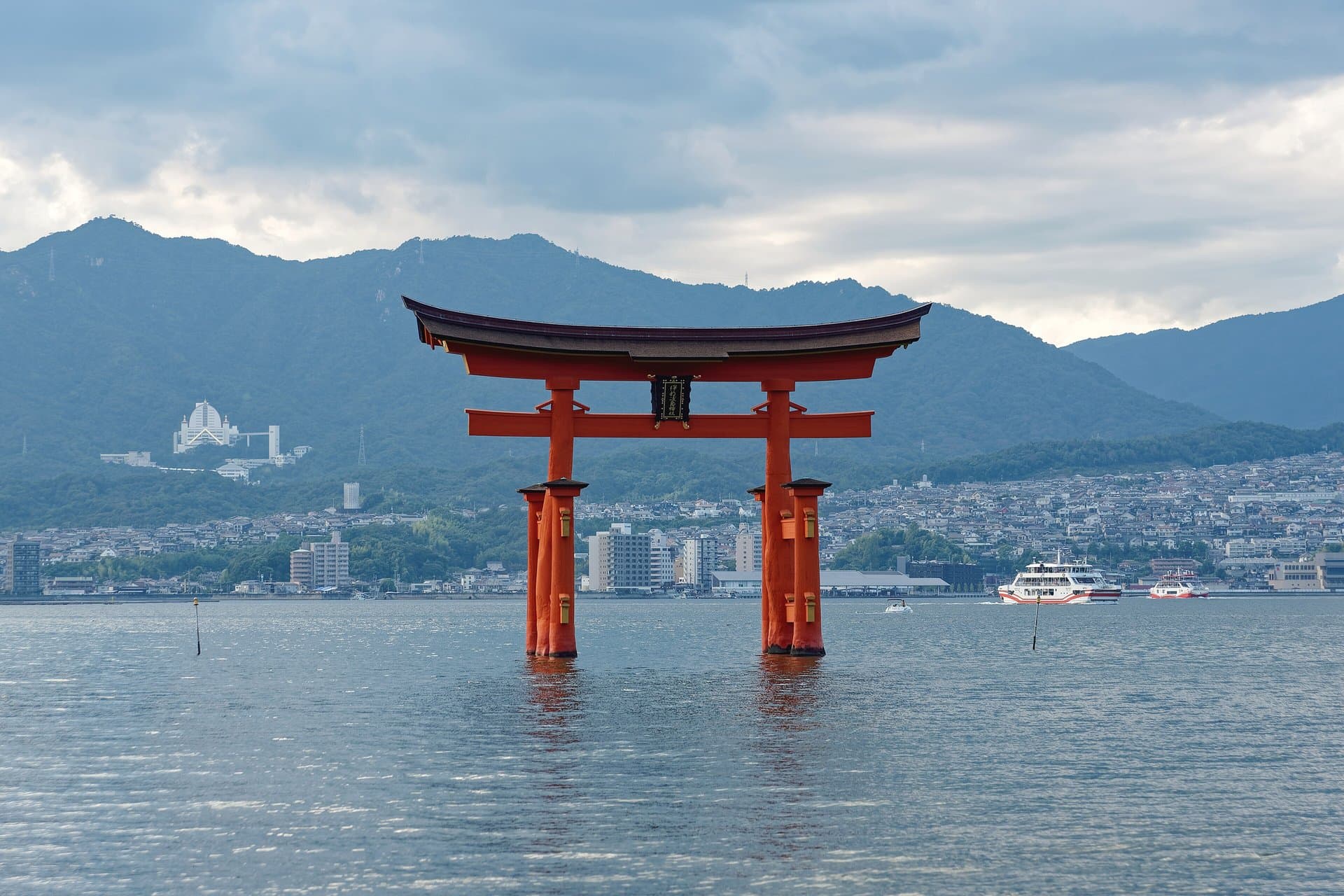 The torii gate of Itsukushima Shrine standing in the water off Miyajima