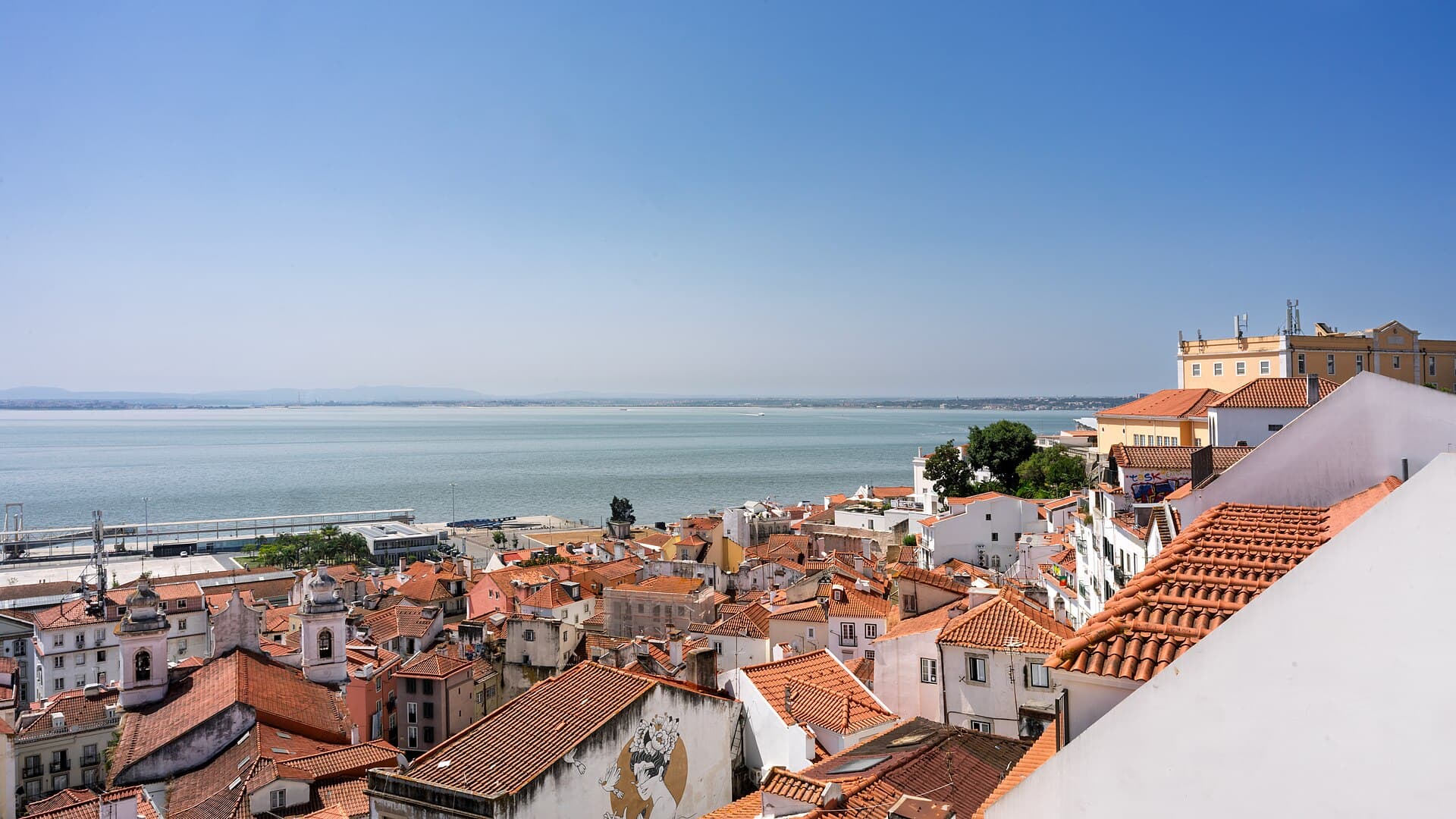 Alfama rooftops overlooking the Tagus River in Lisbon